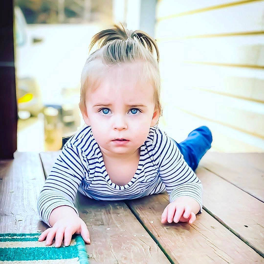 Hayden joined the competition — help win amazing prizes! baby, baby_toddler_clothing, child, eye, eyelash, finger, floor, flooring, grass, happy, hardwood, iris, person, plant, skin, sleeve, smile, table, toddler, wood