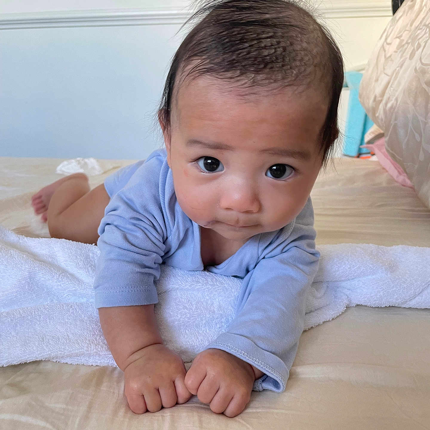 Gumatz joined the competition — help win amazing prizes! baby, bed, blue_clothing, child, cute, expression, eyes, face, furniture, hair, hands, home, indoor, infant, person, rest, skin, towel, tummy_time, young