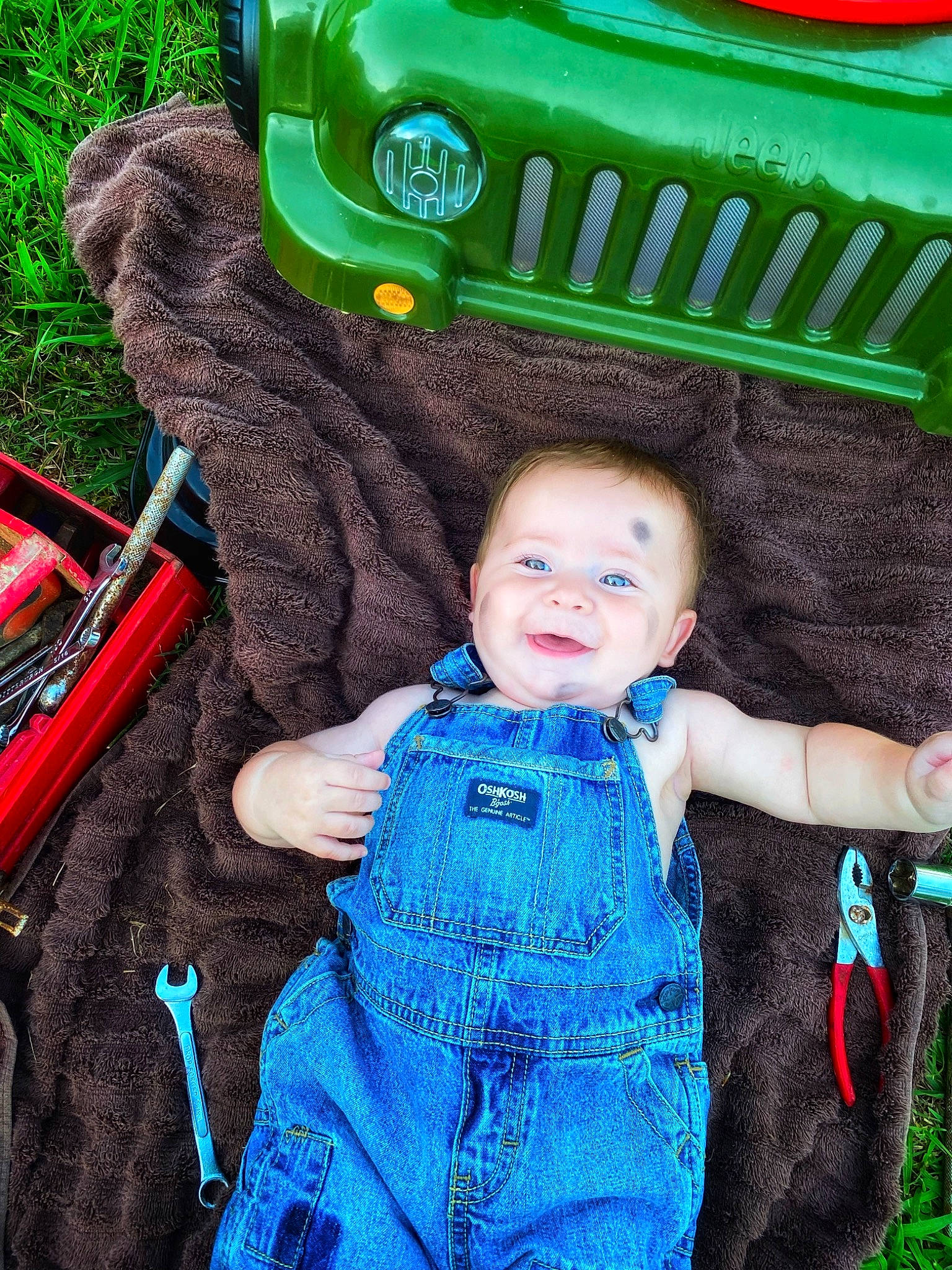 Axton is registered to the contest to win money with this photo: baby, baby_carriage, baby_toddler_clothing, child, cool, fun, grass, green, happy, jacket, leisure, motor_vehicle, organ, people, person, pink, plant, product, skin, toddler
