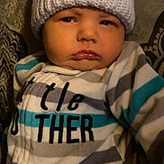 Josiace joined the competition — help win amazing prizes! baby, baseballcap, beanie, bonnet, cap, clothing, couch, face, furniture, glove, hat, head, hood, hoodie, knitwear, newborn, person, photography, portrait, sweater