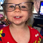 Aurora joined the competition — help win amazing prizes! toddler, child, glasses, smile, red_shirt, minnie_mouse, indoor, face, happy, teeth, person, short_hair, cute, polka_dots, young_child, portrait, clothing, living_room, furniture, window