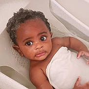 Ezra joined the competition — help win amazing prizes! baby, bathing, bathtub, bed, bodypart, cradle, crib, face, finger, furniture, hand, happy, head, infantbed, newborn, person, photography, portrait, smile, tub