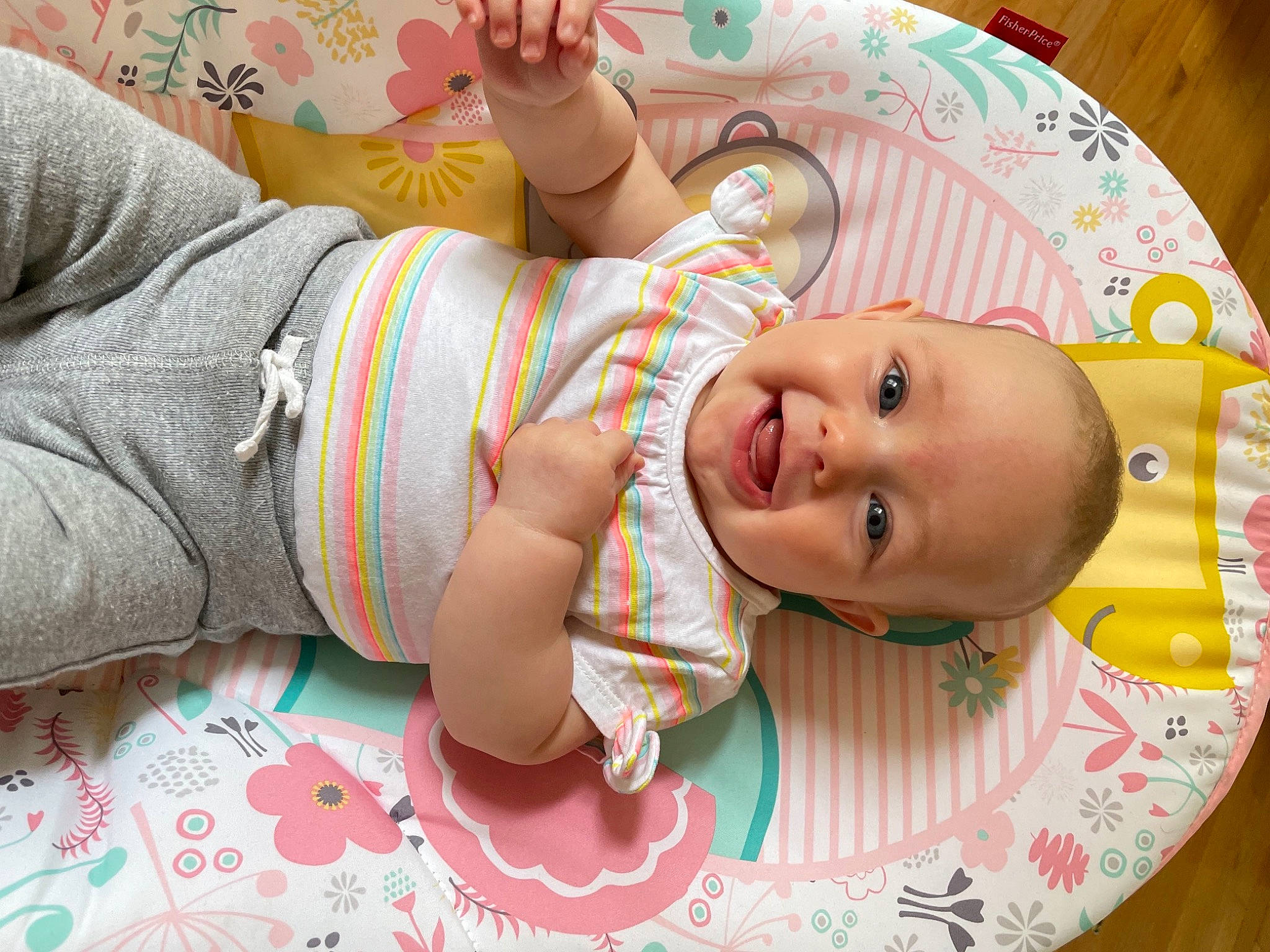 Fiona is registered to the contest to win money with this photo: baby, baby_products, baby_safety, baby_toddler_clothing, cheek, child, comfort, facial_expression, finger, foot, hand, happy, joy, mouth, nail, nose, person, skin, sleeve, smile