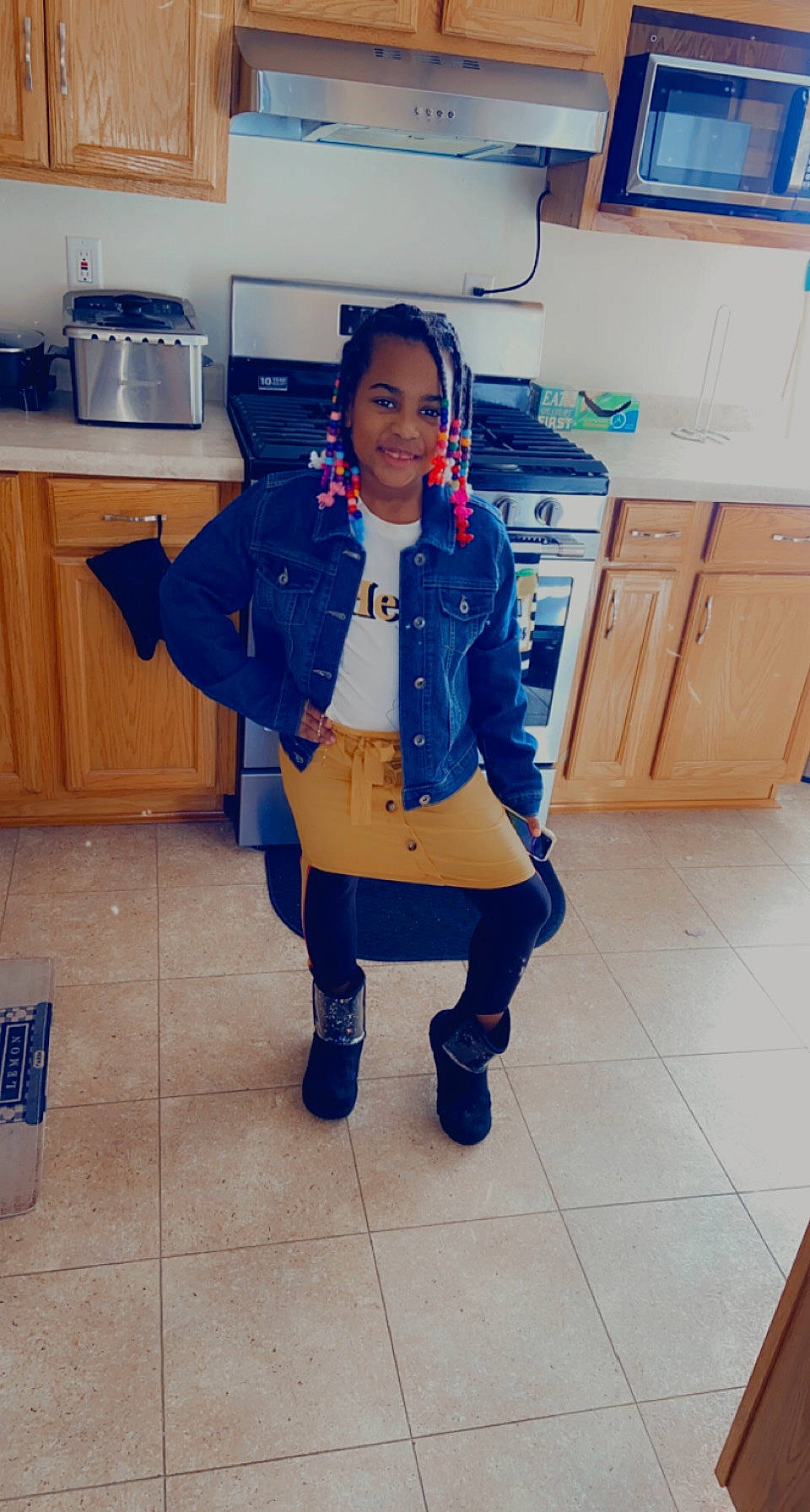 Taliyah is registered to the contest to win money with this photo: belt, boot, cabinetry, cupboard, denim, electric_blue, fashion_design, flooring, home_appliance, human_leg, jacket, joy, kitchen_appliance, knee, leg, person, room, smile, standing, thigh