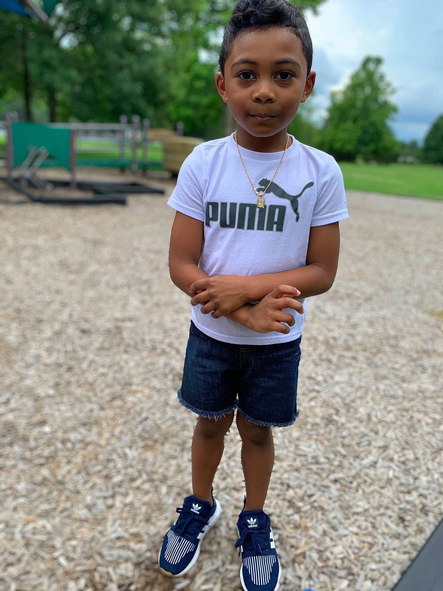 Bryson joined the competition — help win amazing prizes! arm, cool, electric_blue, fun, grass, green, hairstyle, happy, leisure, person, public_space, recreation, shorts, sneakers, standing, street_fashion, summer, t_shirt, toddler, tree