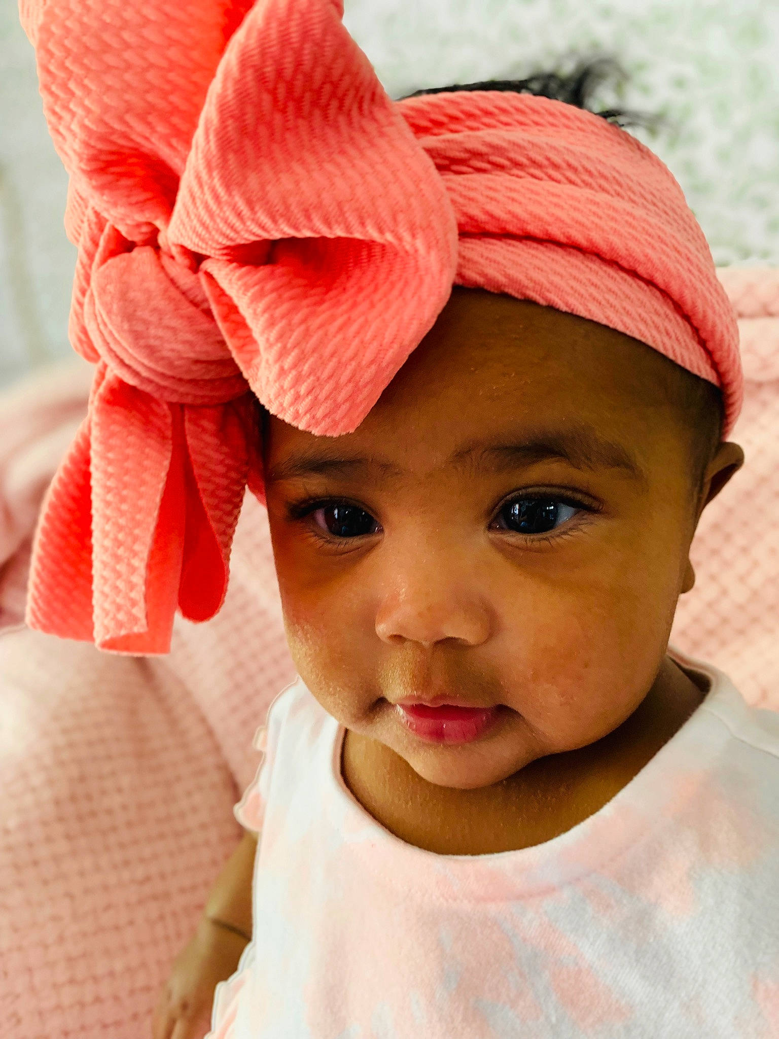 Amaya is registered to the contest to win money with this photo: baby, baby_toddler_clothing, cap, child, chin, eyelash, face, forehead, happy, hat, headgear, headwear, helmet, lip, mouth, neck, nose, person, pink, skin