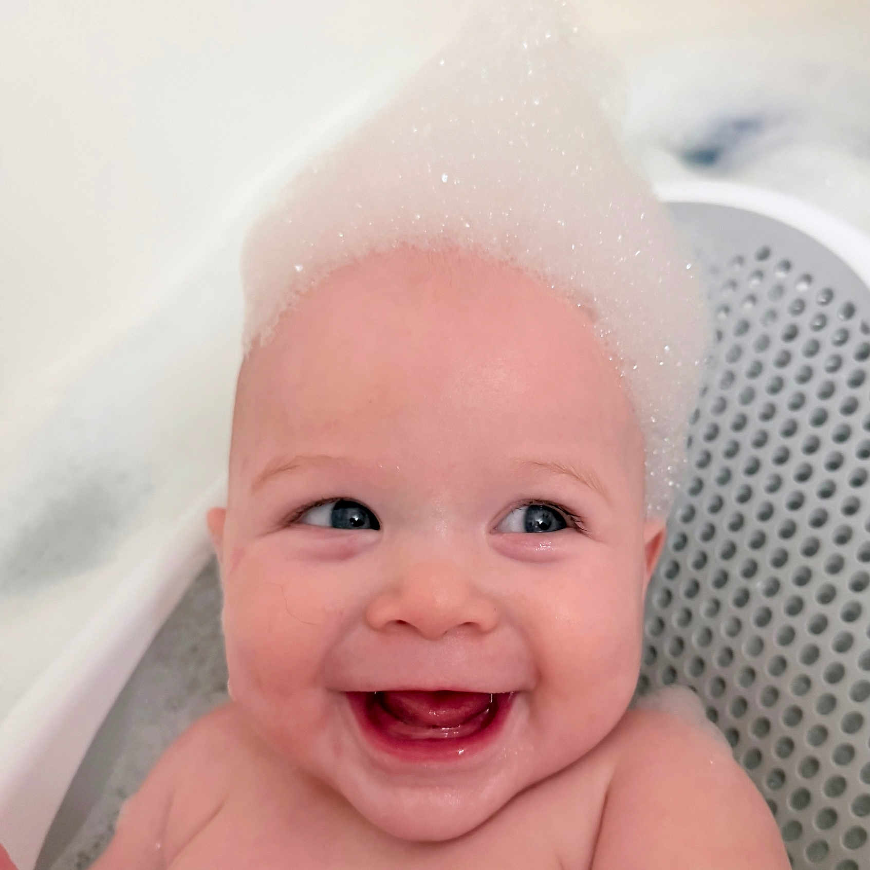 Aila joined the competition — help win amazing prizes! baby, bath, bubbles, smile, happy, child, face, water, foam, skin, cute, infant, head, blue_eyes, joy, tub, wet, expression, playful, bathroom