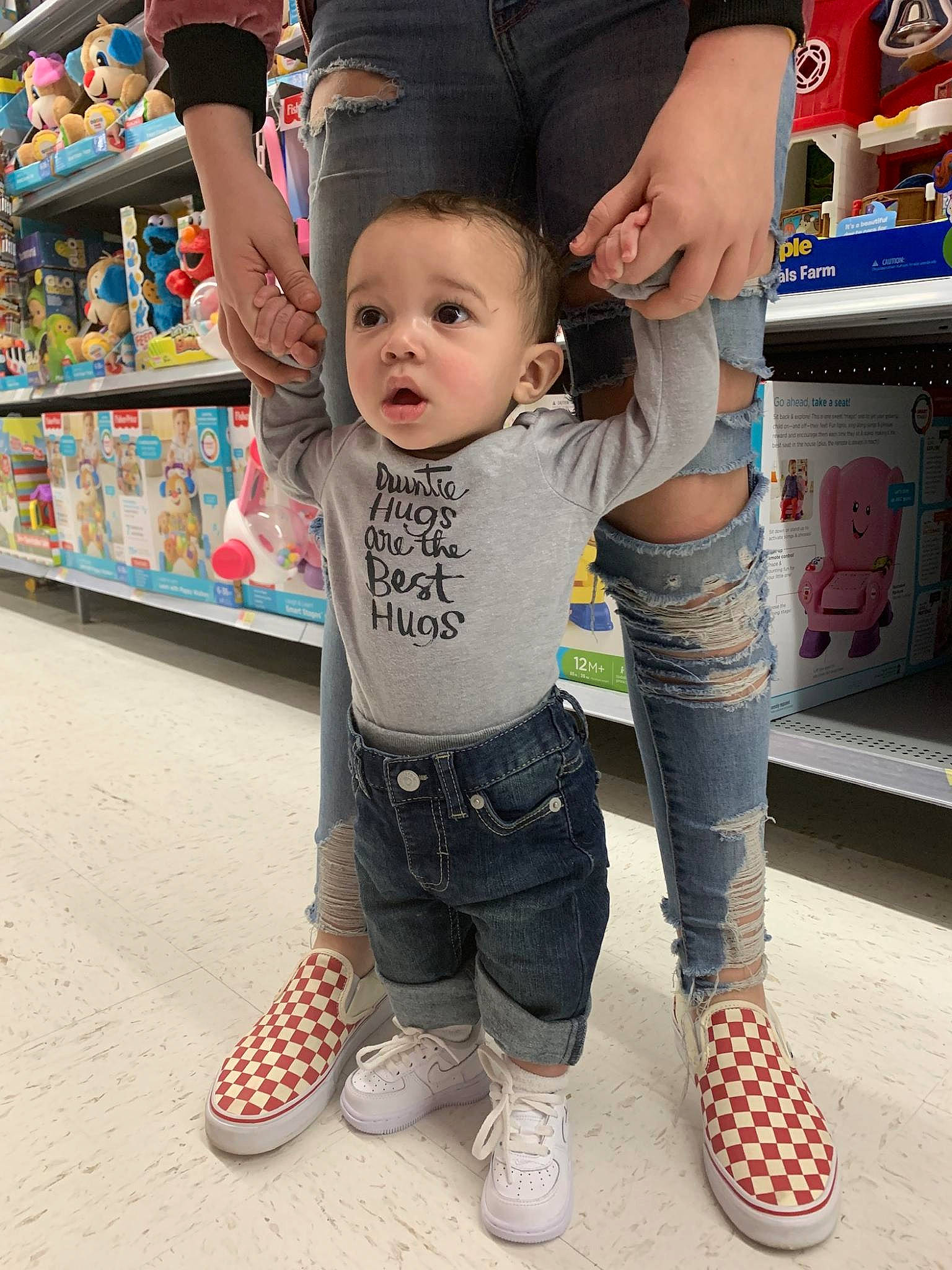 Elijah is registered to the contest to win money with this photo: baby, child, cool, daughter, denim, footwear, fun, happy, human_leg, jeans, joint, leg, male, person, shoe, snapshot, standing, surprise, thigh, toddler
