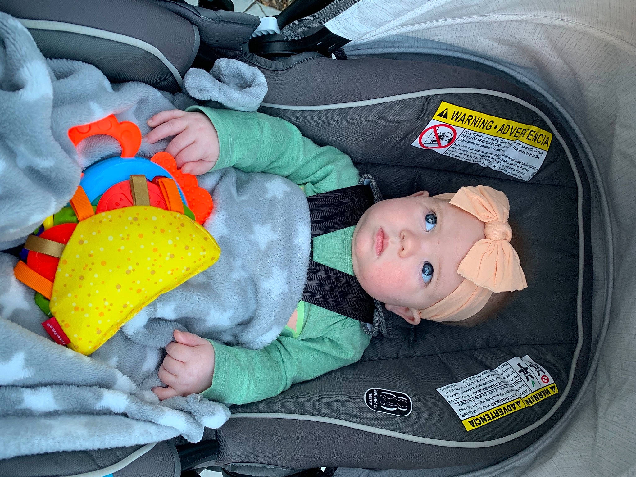 Lilly joined the competition — help win amazing prizes! baby, baby_carriage, baby_in_car_seat, baby_products, baby_safety, baby_sleeping, baby_toddler_clothing, bag, car_seat, comfort, headwear, lap, luggage_and_bags, motor_vehicle, person, product, stuffed_toy, toddler, trunk, vehicle