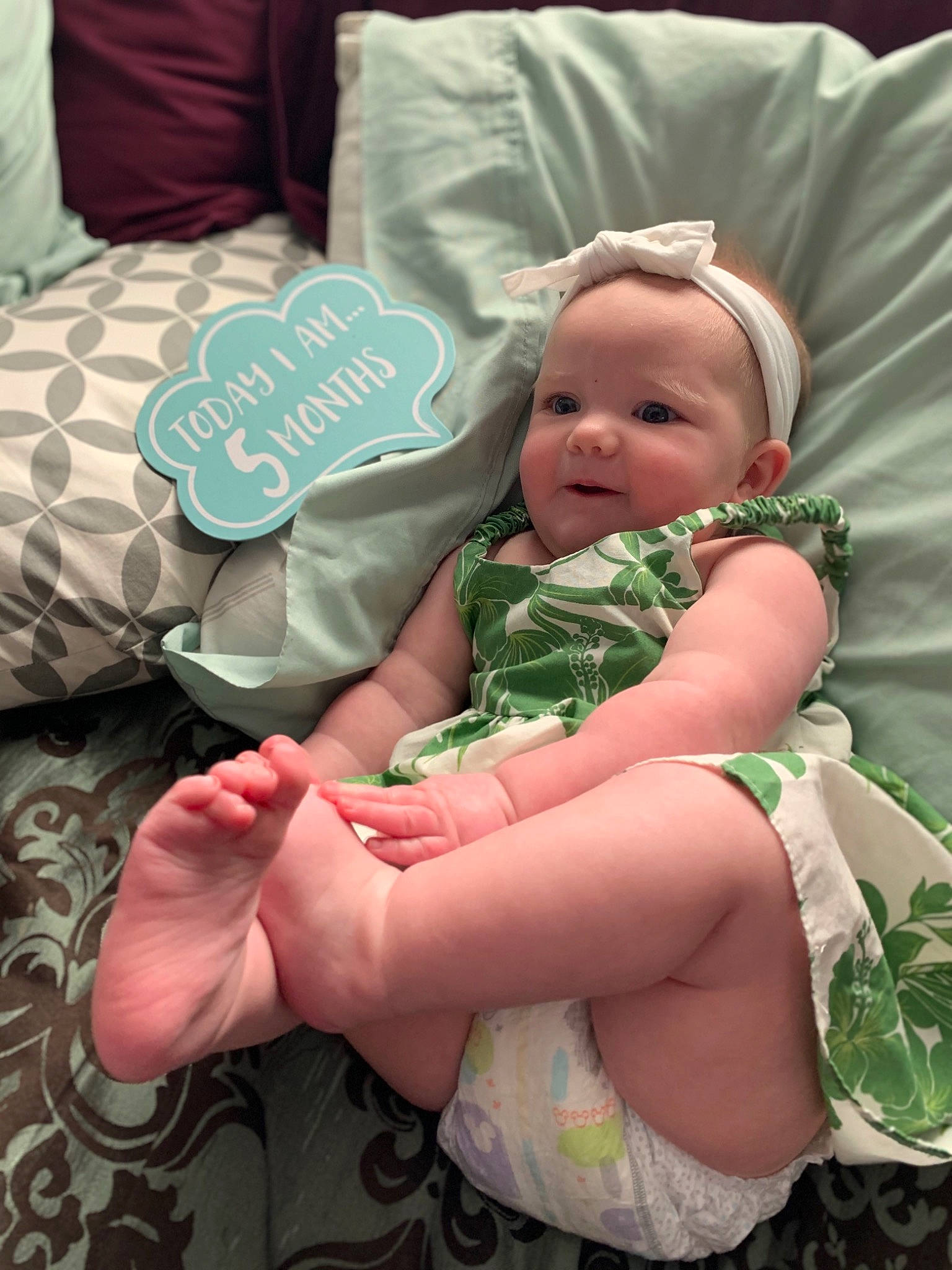 Lilly joined the competition — help win amazing prizes! baby, baby_products, baby_sleeping, baby_toddler_clothing, cheek, child, comfort, event, finger, happy, linens, pattern, person, pink, product, sitting, skin, sock, textile, thumb