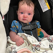 Liyana joined the competition — help win amazing prizes! baby, blanket, blanket_pattern, blue_eyes, buckle, car_seat, child, closeup, cozy, cute, denim_dress, floral_pattern, hand, harness, infant, newborn, pacifier, portrait, seat_padding, warning_label