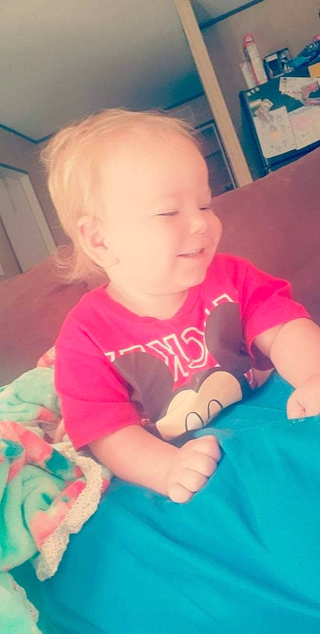 Logan joined the competition — help win amazing prizes! arm, baby, baby_toddler_clothing, cheek, eye, facial_expression, finger, hairstyle, hand, happy, head, human_body, iris, mouth, nose, person, pink, skin, smile, t_shirt