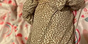Callia is registered to the contest to win money with this photo: baby, infant, newborn, leopard_print, blanket, pattern, clothing, cute, lying_down, face, small_hands, soft_fabric, indoor, cozy, sleepwear, child, adorable, portrait, looking_up, bed
