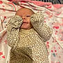 Callia joined the competition — help win amazing prizes! baby, infant, pajamas, blanket, pattern, leopard_print, sleepwear, lying_down, hand, face, cute, newborn, soft, colorful, indoors, cozy, child, portrait, resting, baby_clothes