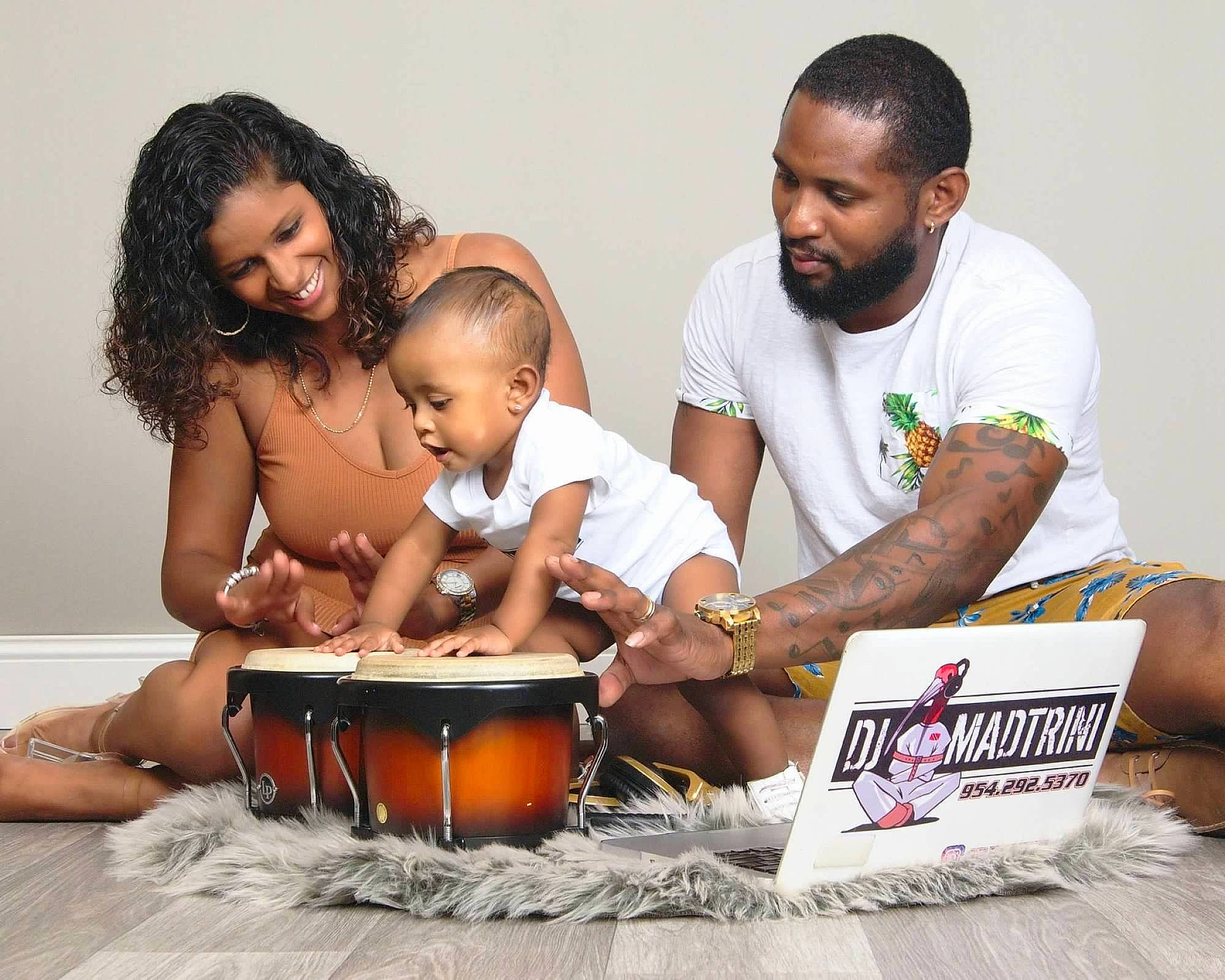 Karoline joined the competition — help win amazing prizes! baby, child, computer, drum, event, fun, happy, human, jewellery, joy, laptop, leisure, membranophone, person, personal_computer, sharing, shorts, sitting, smile, stock_photography