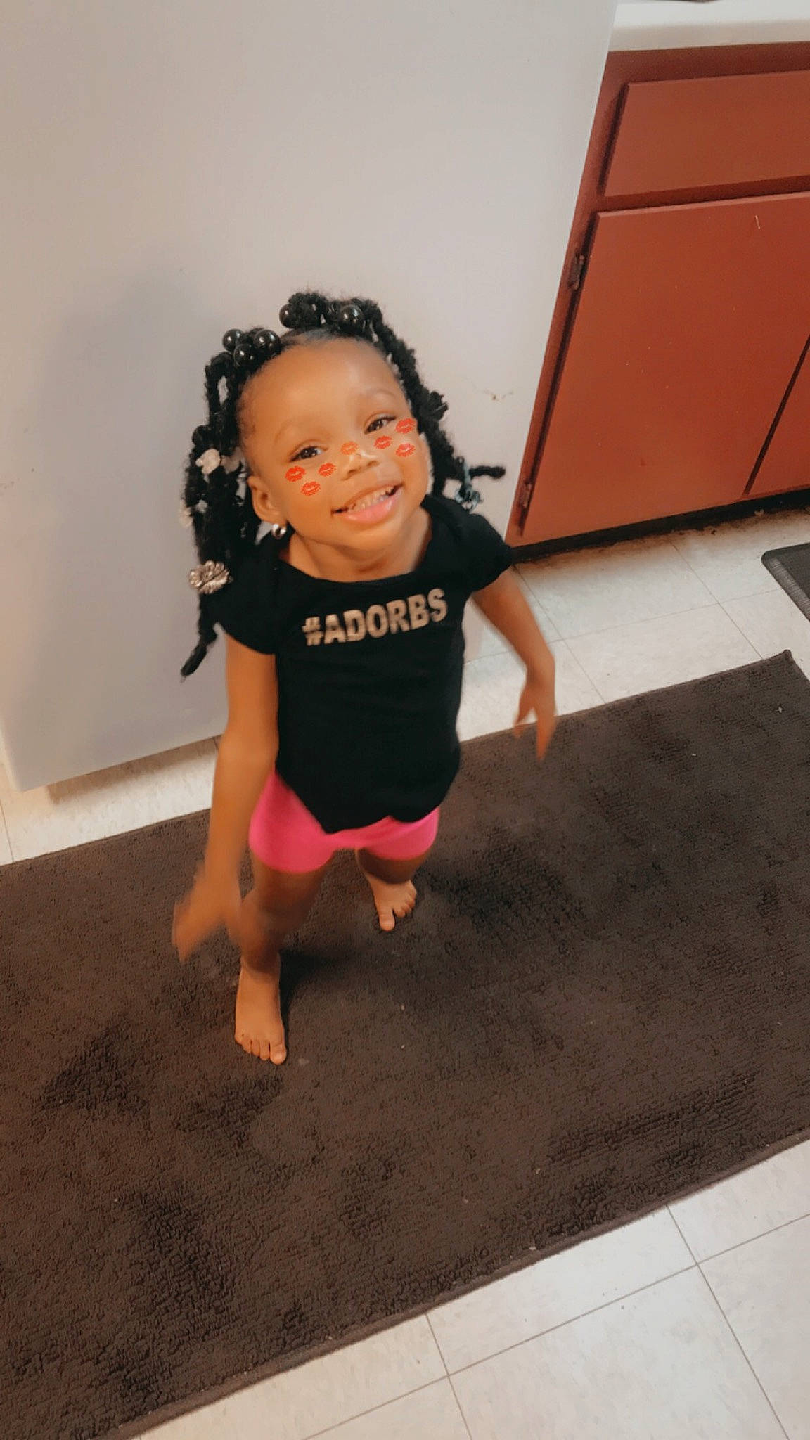 Dakota joined the competition — help win amazing prizes! baby_toddler_clothing, barefoot, child, flash_photography, floor, flooring, fun, happy, human_leg, joint, joy, knee, pattern, person, sandal, shoulder, sleeve, smile, t_shirt, thigh