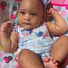 baby, infant, child, headband, romper, barefoot, polka_dots, mickey_mouse, minnie_mouse, blanket, colorful, cute, flexing, sunlight, portrait, sitting, skin, hand, foot, expression