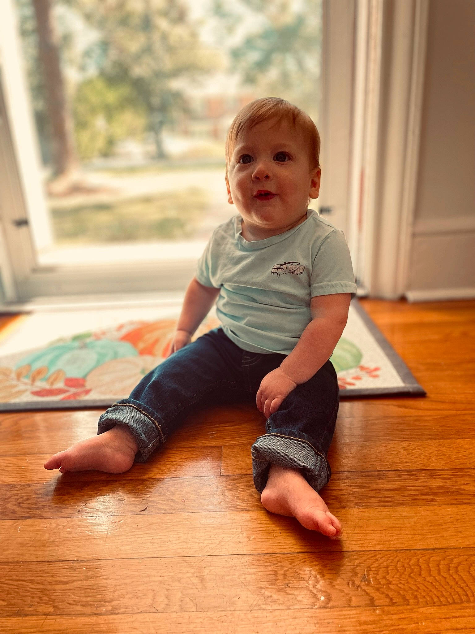Raymond joined the competition — help win amazing prizes! baby, baby_toddler_clothing, barefoot, cheek, child, eye, floor, flooring, foot, happy, hardwood, human_leg, laminate_flooring, person, skin, sleeve, smile, toddler, varnish, wood