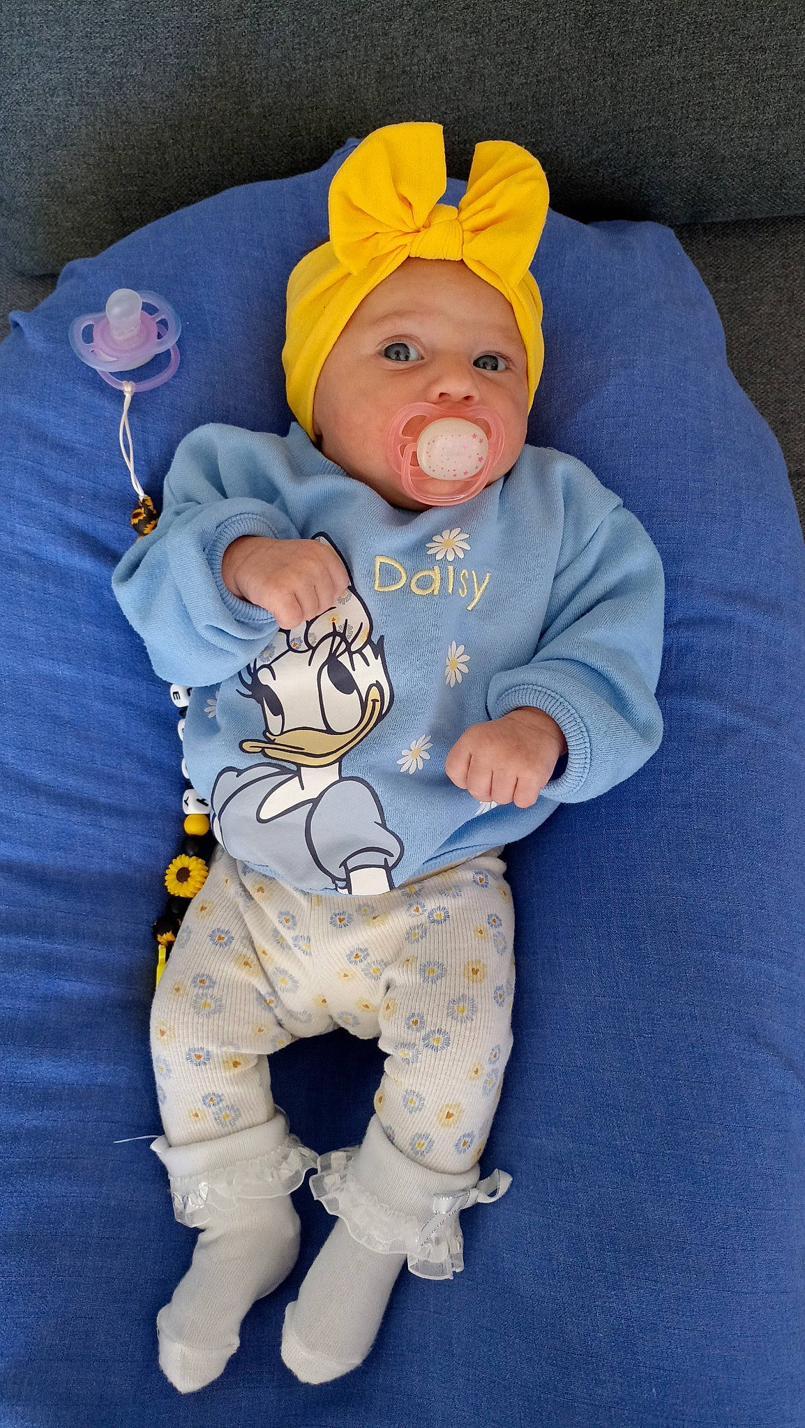 Shelsy a rejoint le concours — aidez-le/la à gagner de superbes lots ! baby, baby_products, baby_sleeping, baby_toddler_clothing, cheek, child, comfort, eye, face, fun, head, headgear, headwear, linens, person, plush, sitting, skin, sleeve, stuffed_toy