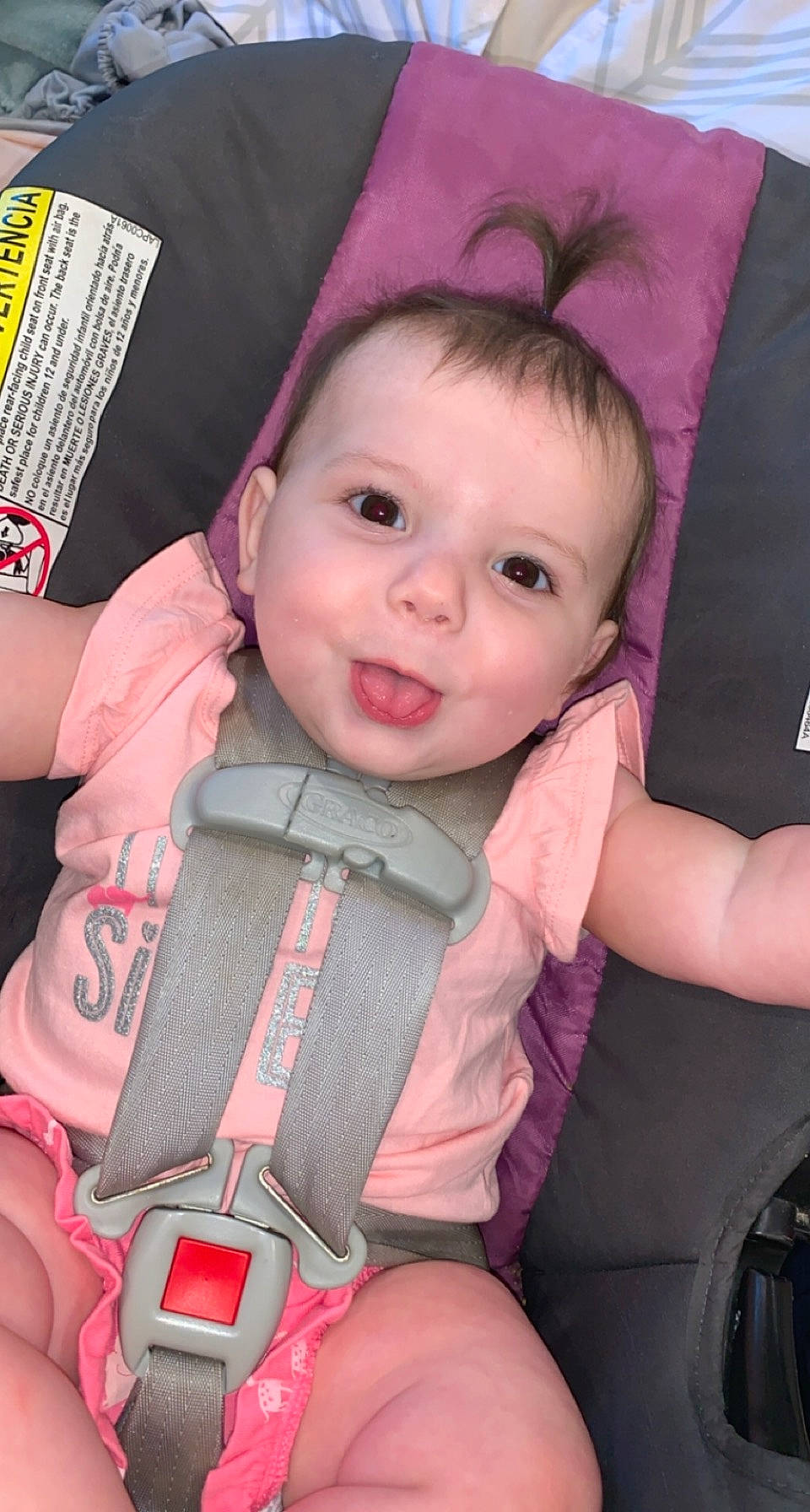 Honey is registered to the contest to win money with this photo: baby, baby_carriage, baby_toddler_clothing, beauty, car_seat, cheek, child, chin, comfort, eye, finger, happy, iris, lap, person, pink, product, skin, sleeve, smile