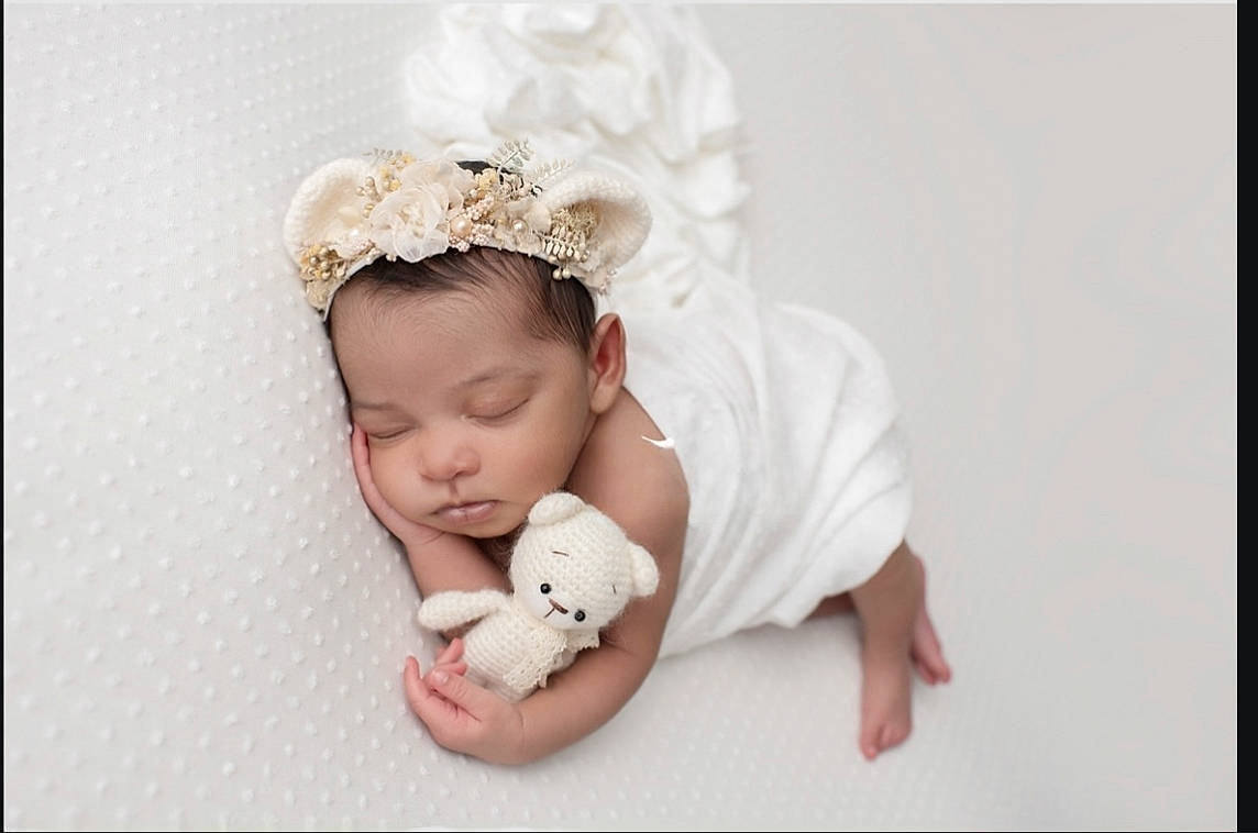 Nova is registered to the contest to win money with this photo: baby, baby_products, baby_sleeping, baby_toddler_clothing, beanie, cap, child, comfort, costume_hat, fashion_accessory, font, happy, headband, headpiece, jewellery, linens, nail, pattern, person, sleeve