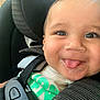 Kaizen joined the competition — help win amazing prizes! baby, child, car_seat, smiling, tongue_out, infant, seatbelt, close_up, happy, cute, face, person, child_seat, car_interior, playful, young_child, joyful, expression, seat, safety