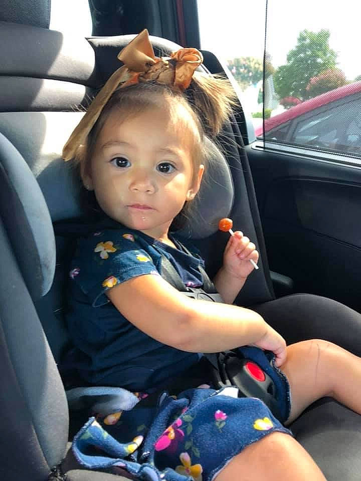 Rosalinda joined the competition — help win amazing prizes! automotive_design, automotive_exterior, car, car_seat, car_seat_cover, comfort, finger, hairstyle, head_restraint, mode_of_transport, motor_vehicle, people, person, plant, steering_part, steering_wheel, summer, toddler, vehicle_door, vertebrate