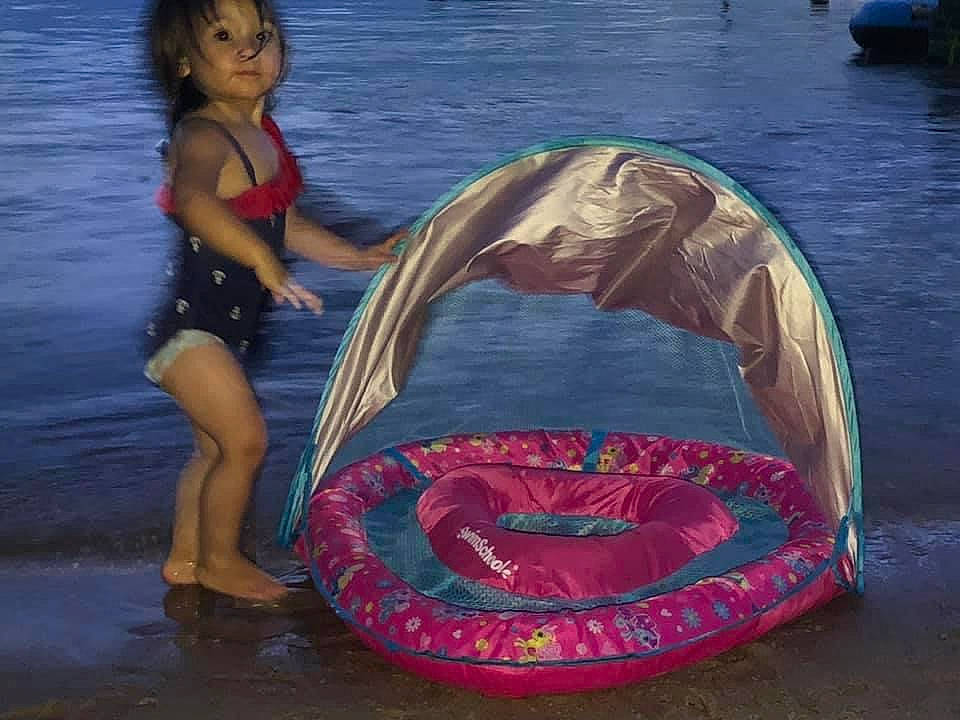 Rosalinda joined the competition — help win amazing prizes! bathing, boats_and_boating_equipment_and_supplies, brassiere, child, flash_photography, fun, games, happy, human_leg, inflatable, leisure, person, personal_protective_equipment, pink, play, recreation, sitting, swimwear, thigh, travel