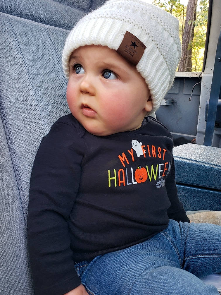 Evalyn joined the competition — help win amazing prizes! baby, beanie, bonnet, cap, cheek, child, clothing, cool, hat, headgear, headwear, knit_cap, knitting, outerwear, person, sleeve, smile, t_shirt, toddler