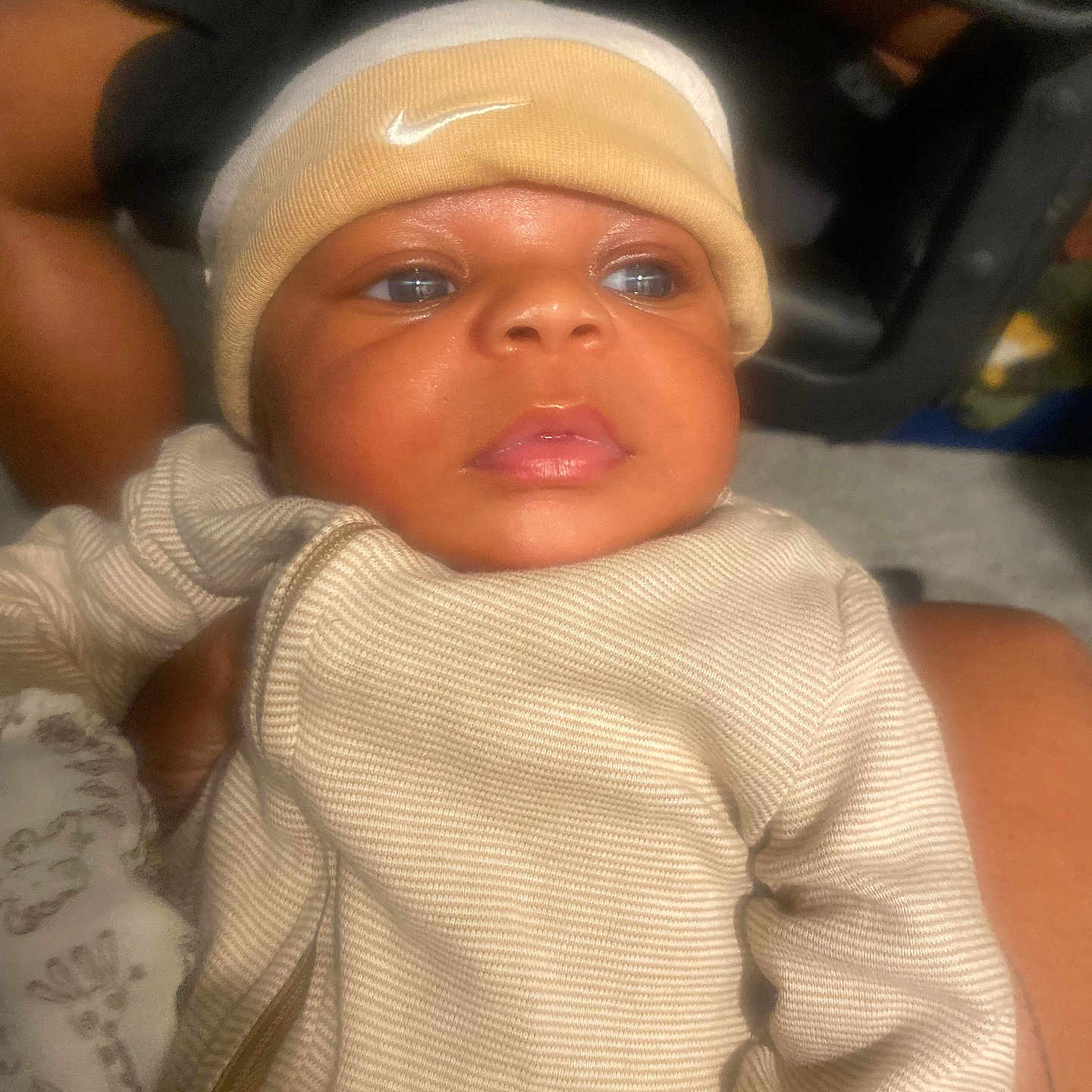 Anun is registered to the contest to win money with this photo: architecture, baby, baseballcap, beanie, bodypart, bonnet, building, cap, clothing, face, finger, glove, hand, hat, head, hospital, newborn, person, photography, portrait