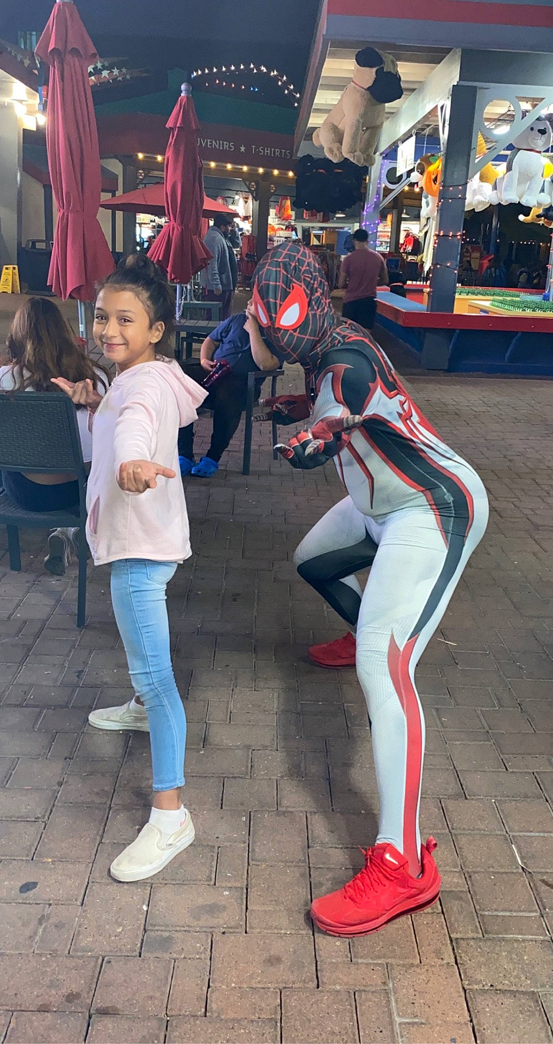 Caylee is registered to the contest to win money with this photo: boot, carmine, chair, costume, electric_blue, entertainment, event, fictional_character, footwear, fun, human_leg, leisure, performing_arts, person, recreation, sandal, shoe, sneakers, spandex, sportswear