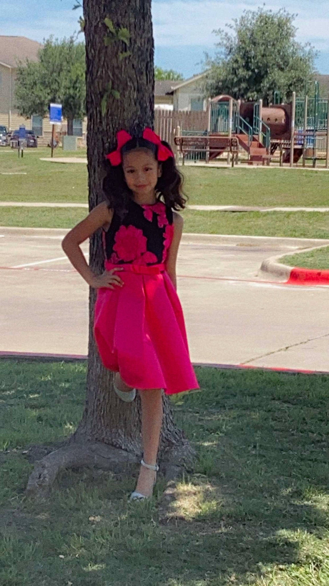 Lexi Reyna is registered to the contest to win money with this photo: day_dress, dress, electric_blue, event, fashion_design, formal_wear, grass, happy, human_leg, joy, leisure, magenta, one_piece_garment, person, pink, recreation, sky, sleeve, thigh, tree