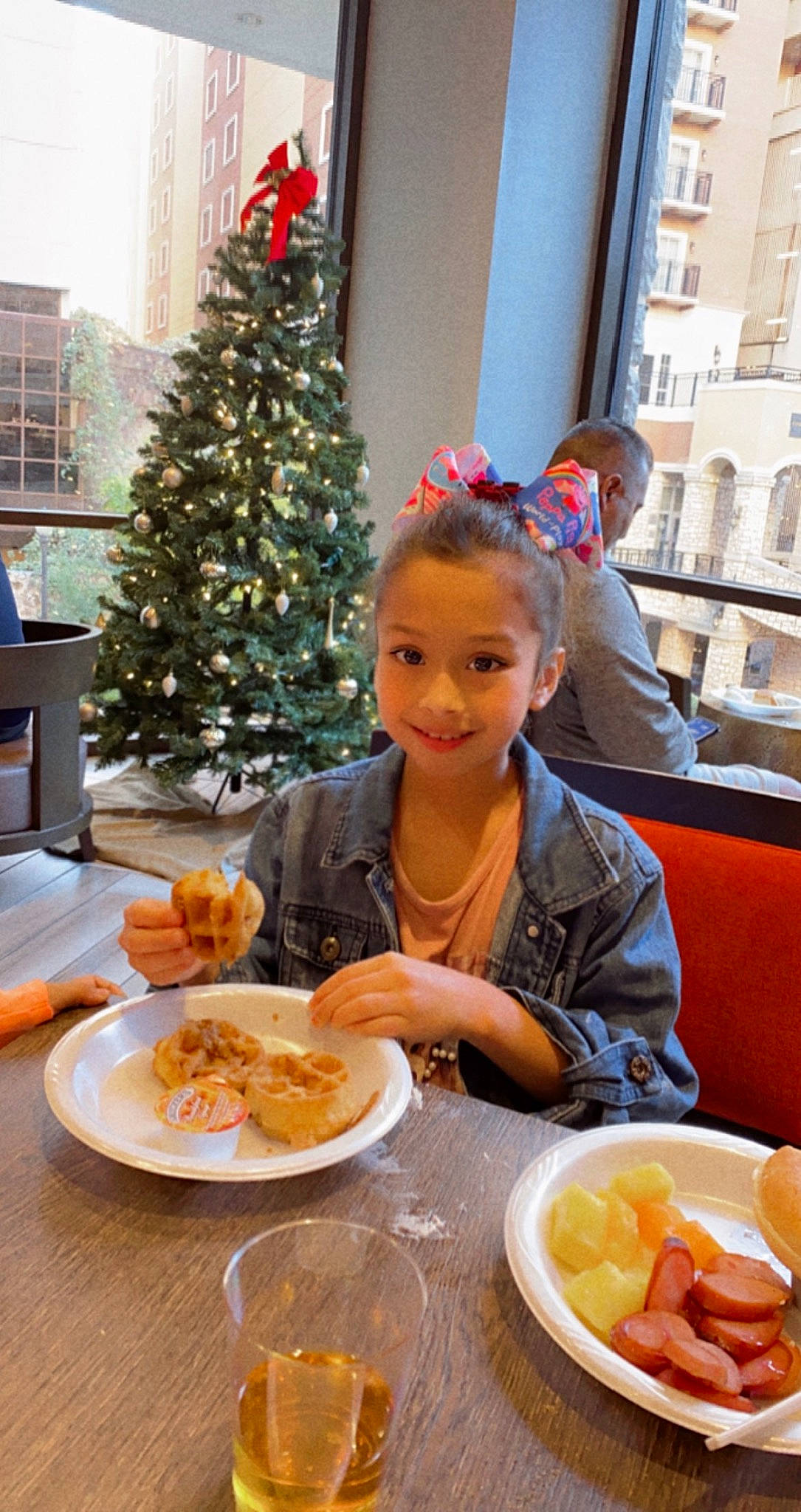 Lexi Reyna is registered to the contest to win money with this photo: chair, christmas_decoration, christmas_tree, comfort_food, cuisine, dish, event, fast_food, finger_food, food, food_craving, holiday, ingredient, joy, person, plate, recipe, smile, table, tableware