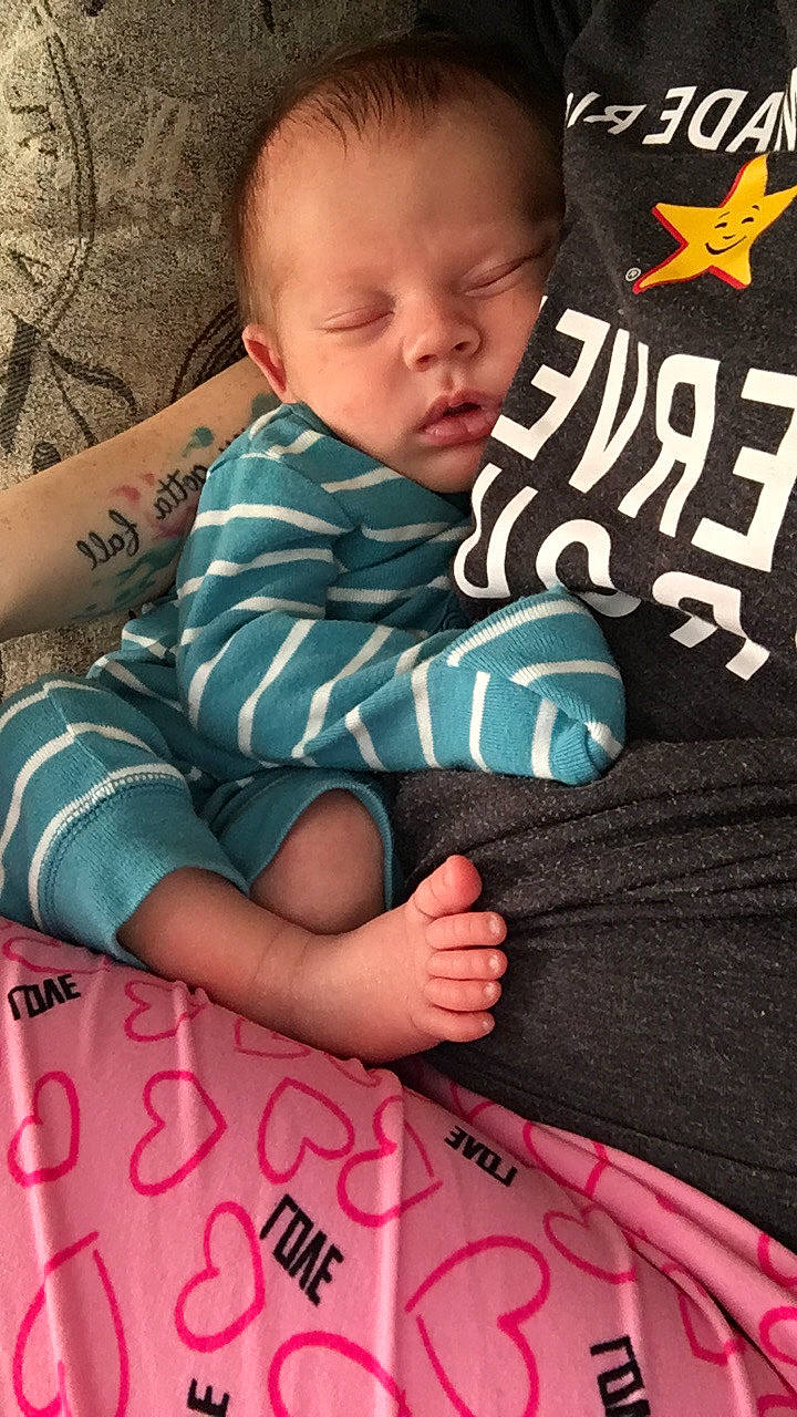 Syrus is registered to the contest to win money with this photo: arm, baby, bedtime, cheek, child, finger, hand, nap, person, play, skin, sleep, textile, toddler