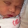 Neveah is registered to the contest to win money with this photo: baby, blanket, child, closeup, cozy, cute, eyes_closed, face, head, infant, mouth, newborn, peaceful, portrait, rest, skin, sleep, sleeping, soft, wrapped