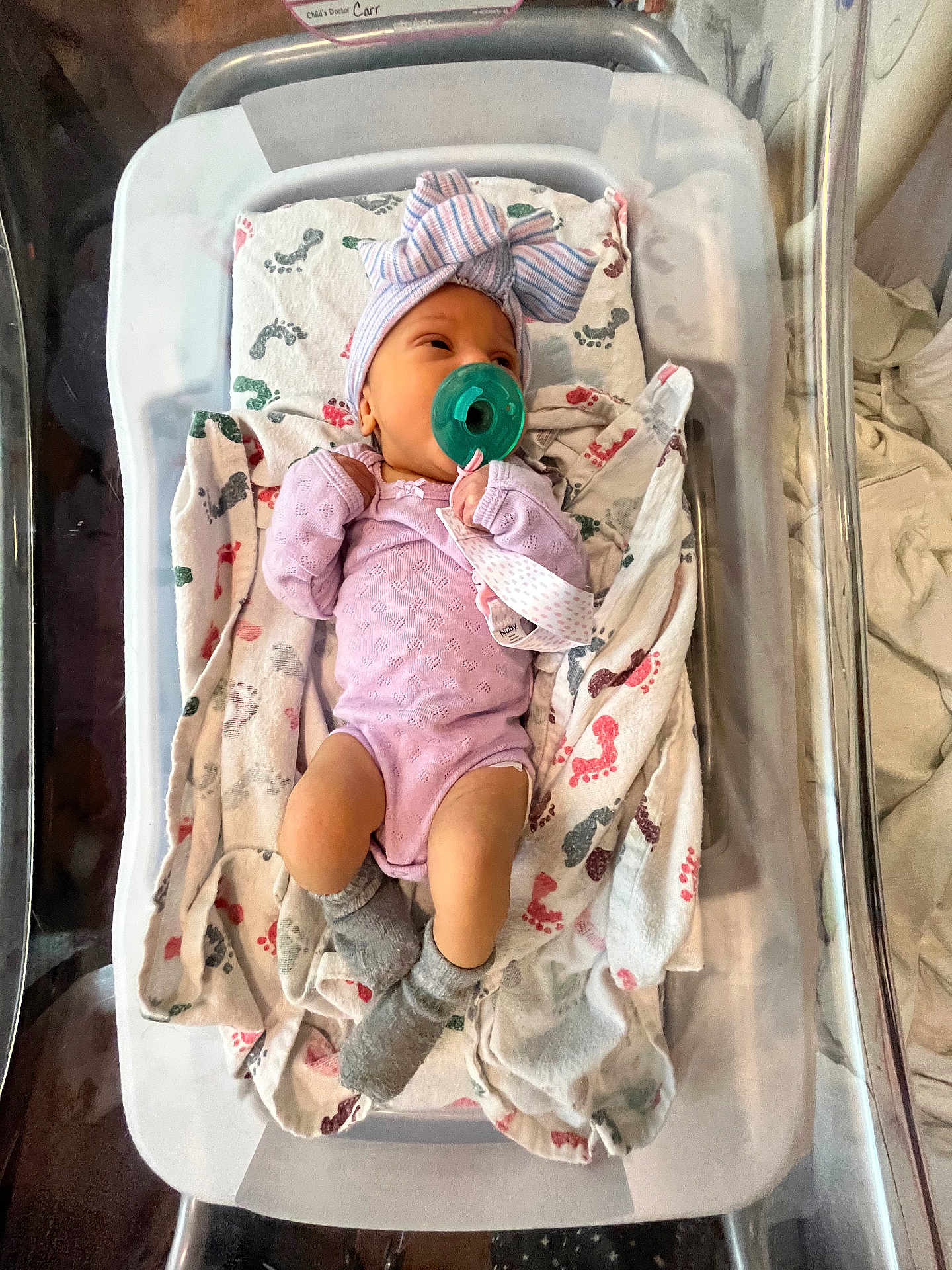 Neveah joined the competition — help win amazing prizes! baby, blanket, child, cozy, cute, footprint_pattern, headwrap, hospital, hospital_bassinet, infant, lying_down, newborn, nursery, onesie, pacifier, person, resting, sleeping, sock, soft_fabric
