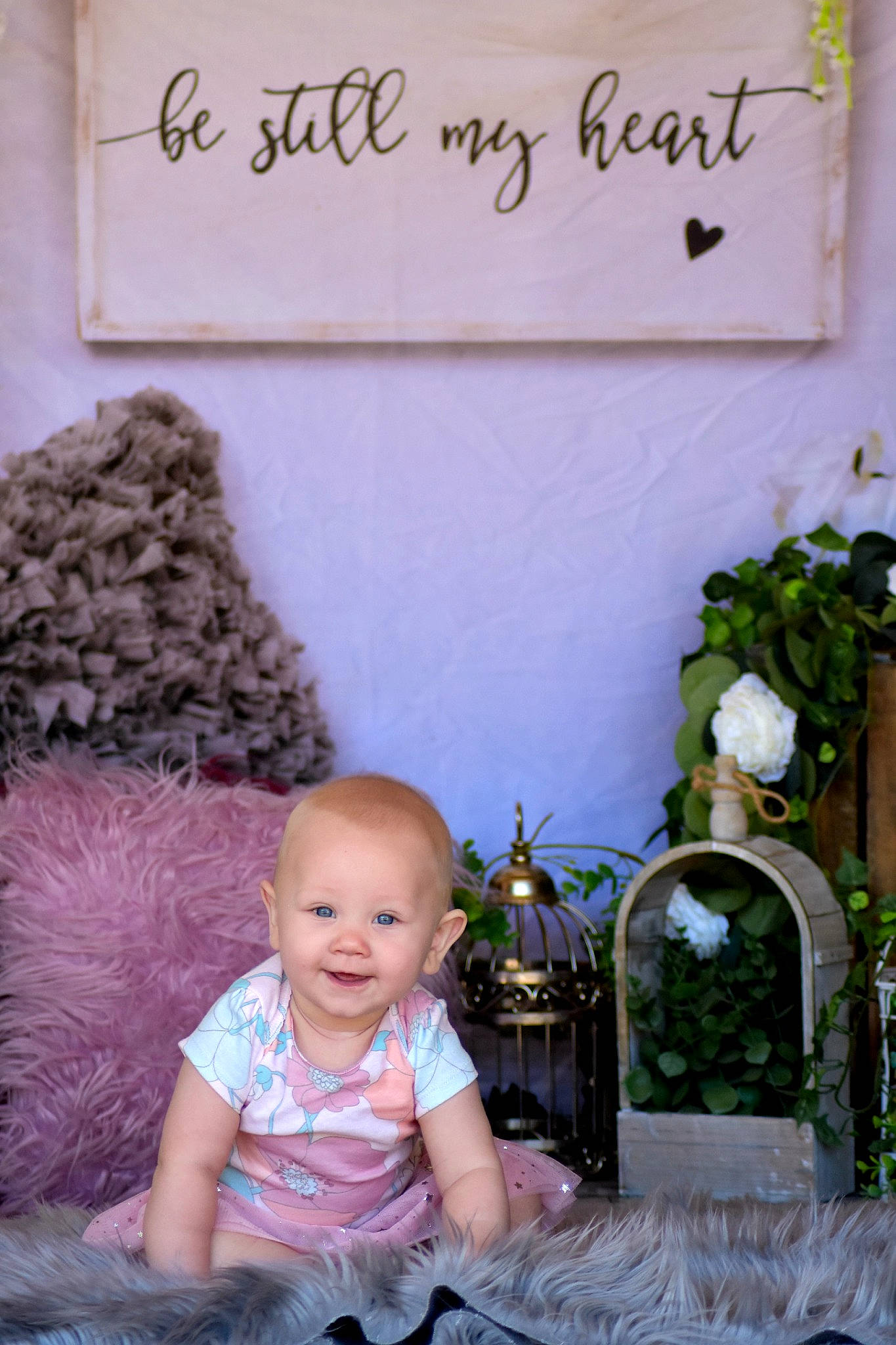 Azaylia is registered to the contest to win money with this photo: baby, child, family, joy, people, person, pink, plant, room, sitting, toddler, vacation
