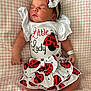baby, newborn, sleeping, infant, clothing, headband, bow, ladybug, pattern, blanket, cute, peaceful, resting, skin, hand, foot, dress, soft, portrait, child
