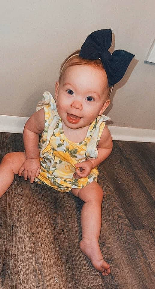 Kimber is registered to the contest to win money with this photo: baby, baby_toddler_clothing, cheek, dress, eye, finger, hair, hand, head, human_body, iris, leg, lip, neck, nose, person, pink, shoulder, skin, sleeve