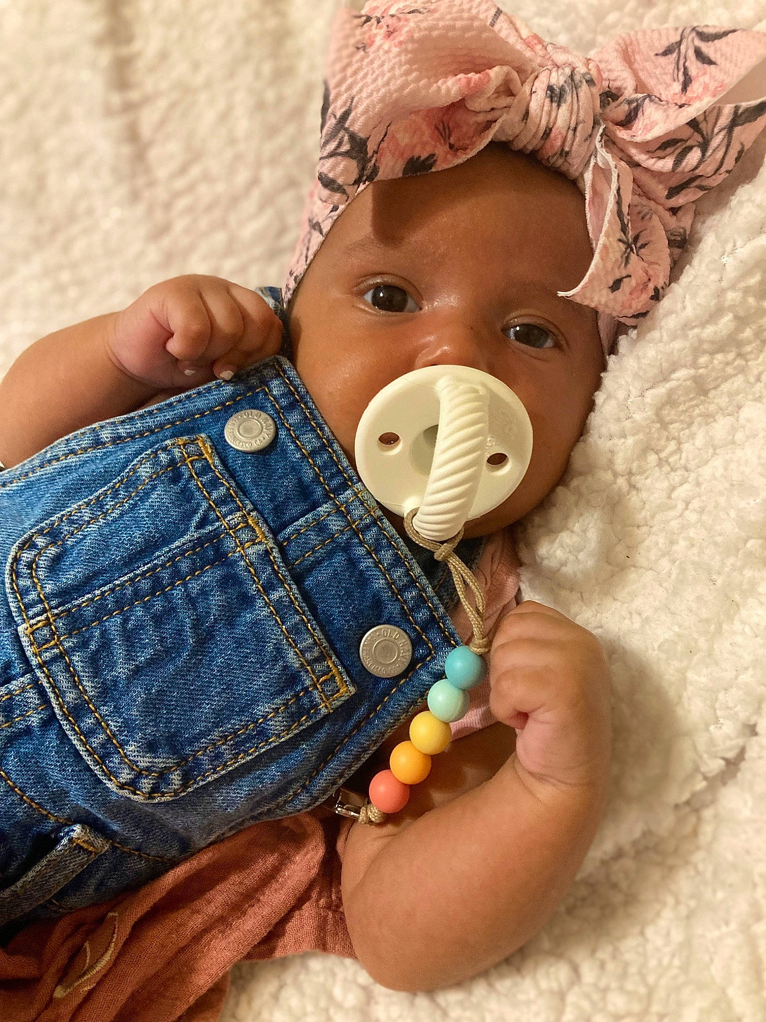 Everleigh joined the competition — help win amazing prizes! baby, baby_toddler_clothing, cap, eyelash, face, finger, gesture, hand, happy, hat, headgear, iris, jeans, lip, nail, neck, person, skin, textile, toddler