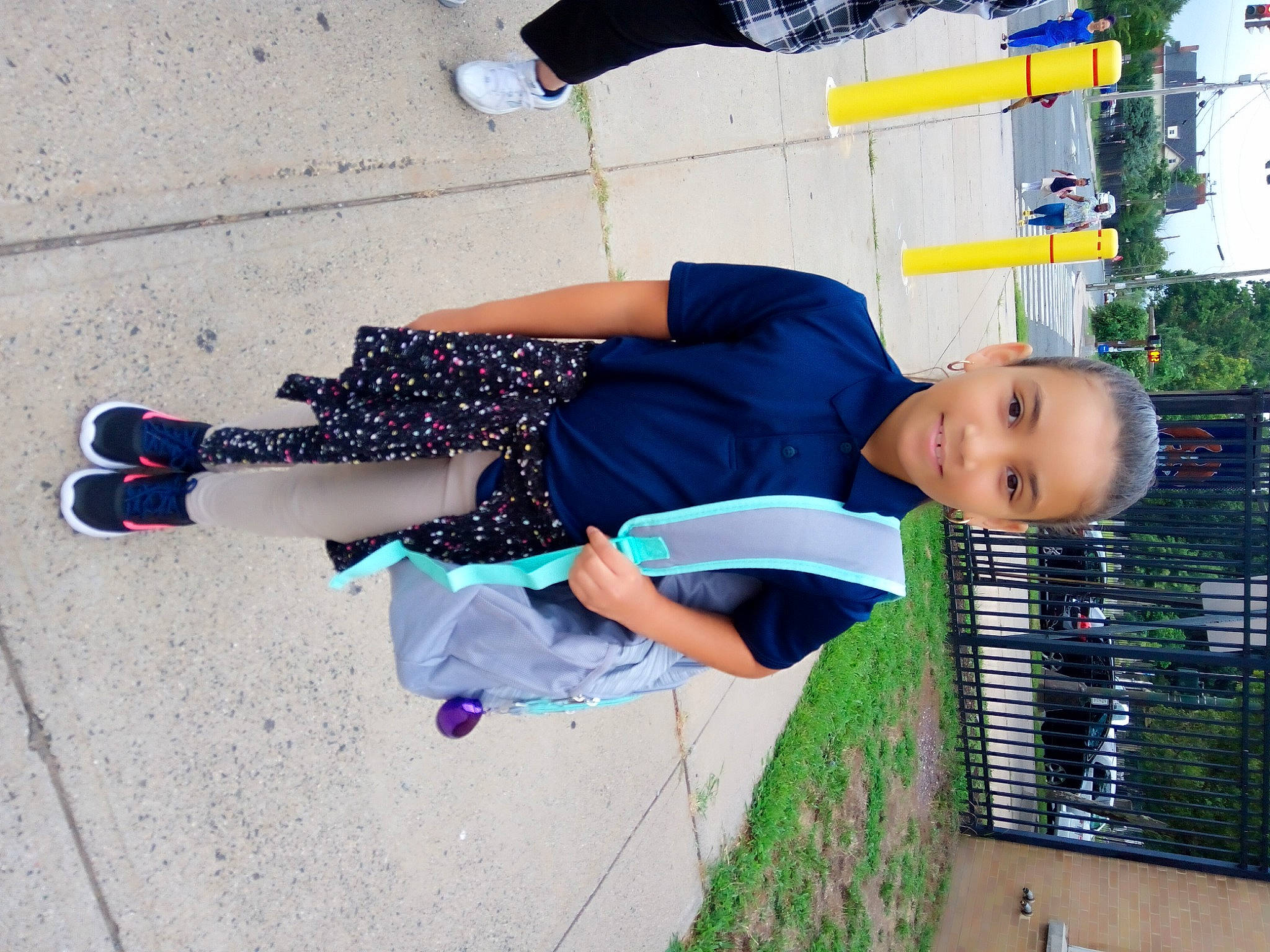 Isabella joined the competition — help win amazing prizes! blurred, child, city, denim, electric_blue, fun, happy, human_leg, joy, knee, leisure, pattern, pedestrian, person, sitting, smile, street, t_shirt, thigh, travel