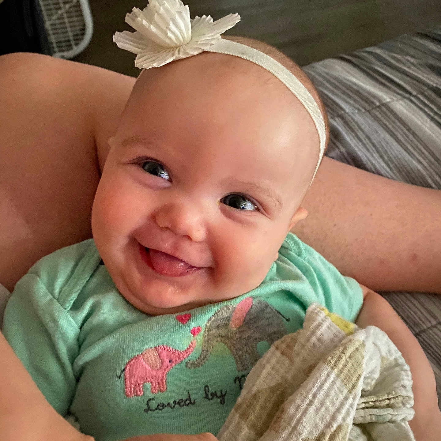 Taytum joined the competition — help win amazing prizes! accessories, baby, babylaughing, clothing, cushion, face, happy, head, headband, homedecor, jewelry, laughing, necklace, newborn, person, photography, portrait, sitting, smile, t_shirt