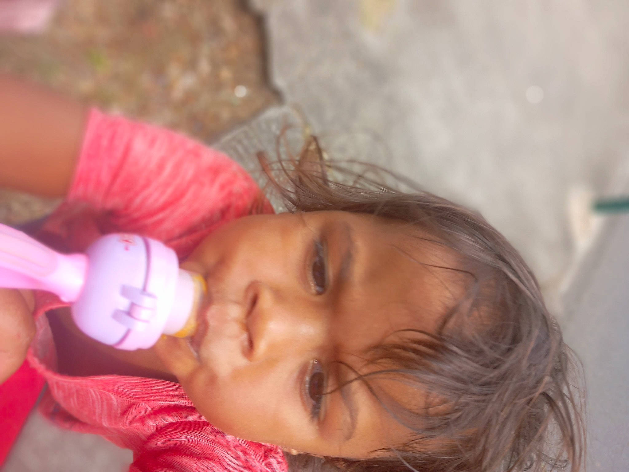 Nelcy participe au concours pour gagner de l'argent avec cette photo : baby, baby_bottle, baby_toddler_clothing, cheek, child, drinkware, ear, eyelash, face, finger, happy, human_body, lip, mouth, nail, nose, person, plastic_bottle, skin, smile