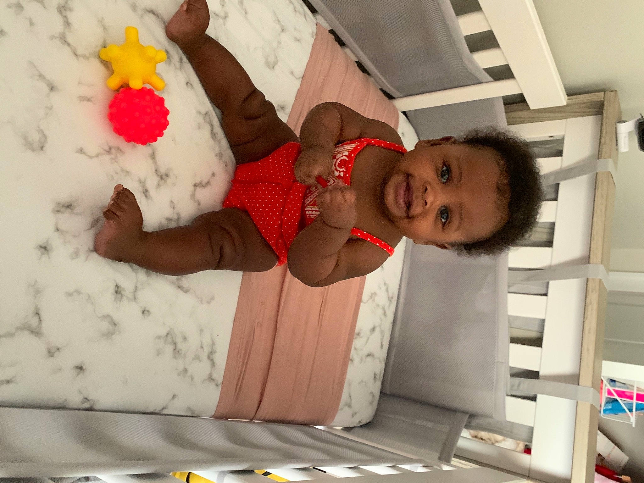 Kynsleigh is registered to the contest to win money with this photo: baby, baby_products, baby_safety, baby_sleeping, baby_toddler_clothing, bed, child, comfort, elbow, facial_expression, flooring, fun, linens, person, product, skin, smile, stomach, textile, thigh