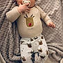 Elyo a rejoint le concours — aidez-le/la à gagner de superbes lots ! baby, infant, pacifier, blanket, pajamas, reindeer, christmas, cute, child, sleepwear, soft, lying_down, indoors, warm, cozy, socks, face, hands, expression, comfort