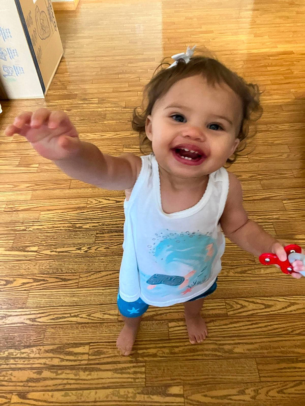 Isabella joined the competition — help win amazing prizes! baby, baby_toddler_clothing, cheek, finger, floor, flooring, fun, hand, happy, hardwood, joint, joy, leisure, nose, person, skin, smile, standing, thumb, toddler