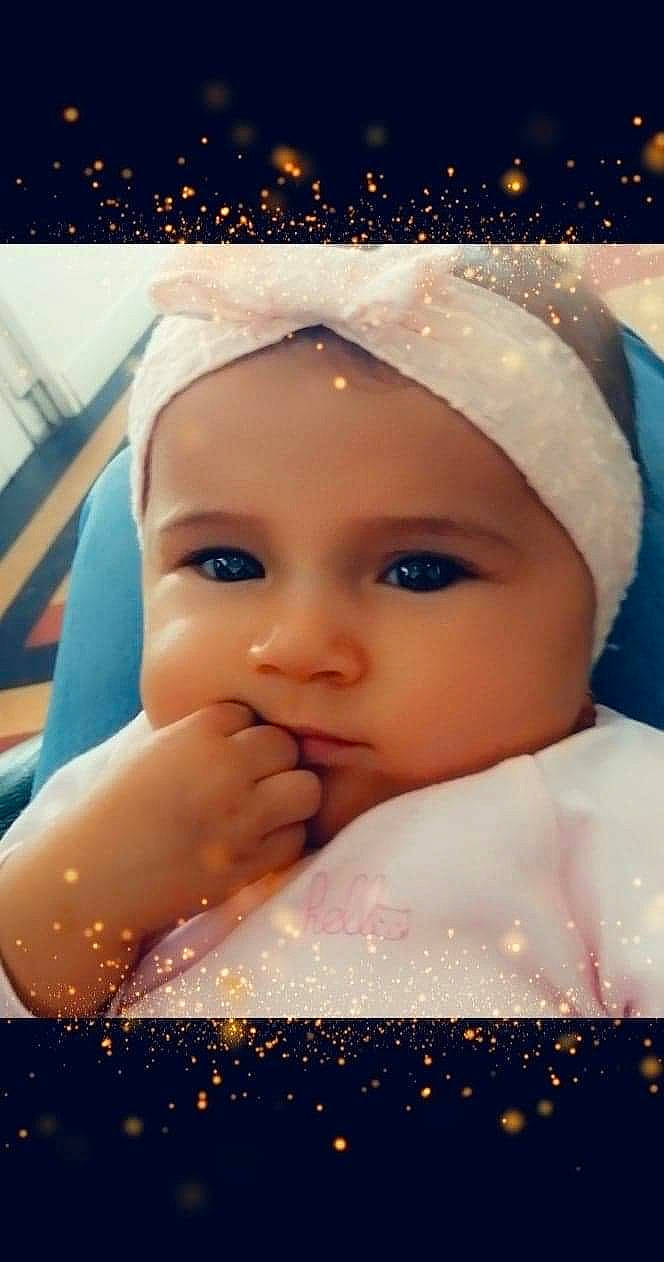 Sokayna participe au concours pour gagner de l'argent avec cette photo : baby, cheek, child, eye, eyebrow, eyelash, face, forehead, head, headwear, lip, nose, person, photography, skin, sky, smile, toddler