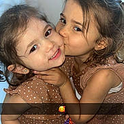 Keziah a rejoint le concours — aidez-le/la à gagner de superbes lots ! accessories, bodypart, bracelet, child, clothing, dress, earring, face, female, girl, happy, head, jewelry, kissing, necklace, person, photography, portrait, romantic, smile