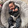 baby, baby_chair, black_shoes, blanket, child, clothing, cute, diapers, dimples, floor_tiles, gray_outfit, happy, home_decor, indoor, infant, nike_sneakers, person, plush, seated, smiling