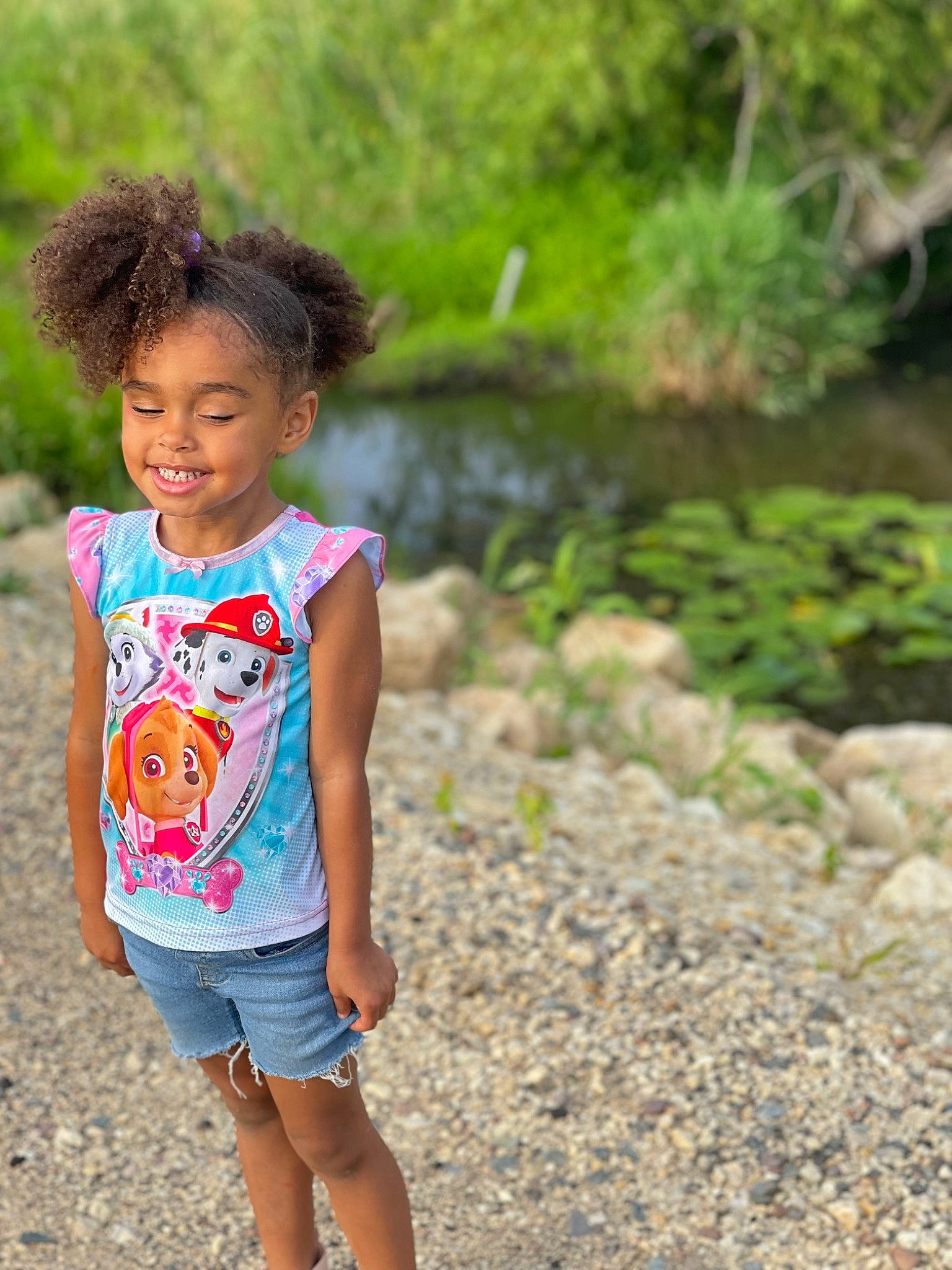 Alyse is registered to the contest to win money with this photo: child, denim, forest, grass, happy, joy, landscape, leisure, nature, people_in_nature, person, plant, recreation, shorts, sleeve, smile, soil, t_shirt, toddler, waist